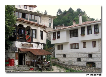 A local inn and tavern are tucked into the hillside.